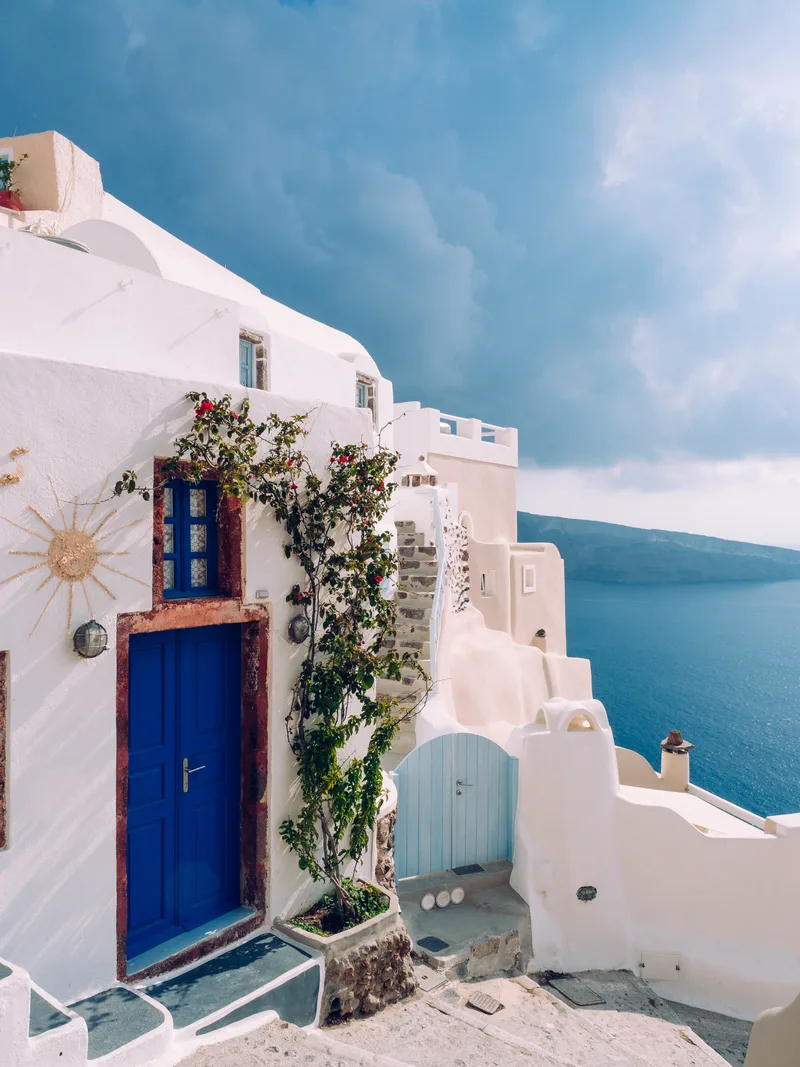 Vertical Shot Building With Blue Door Santorini Greece