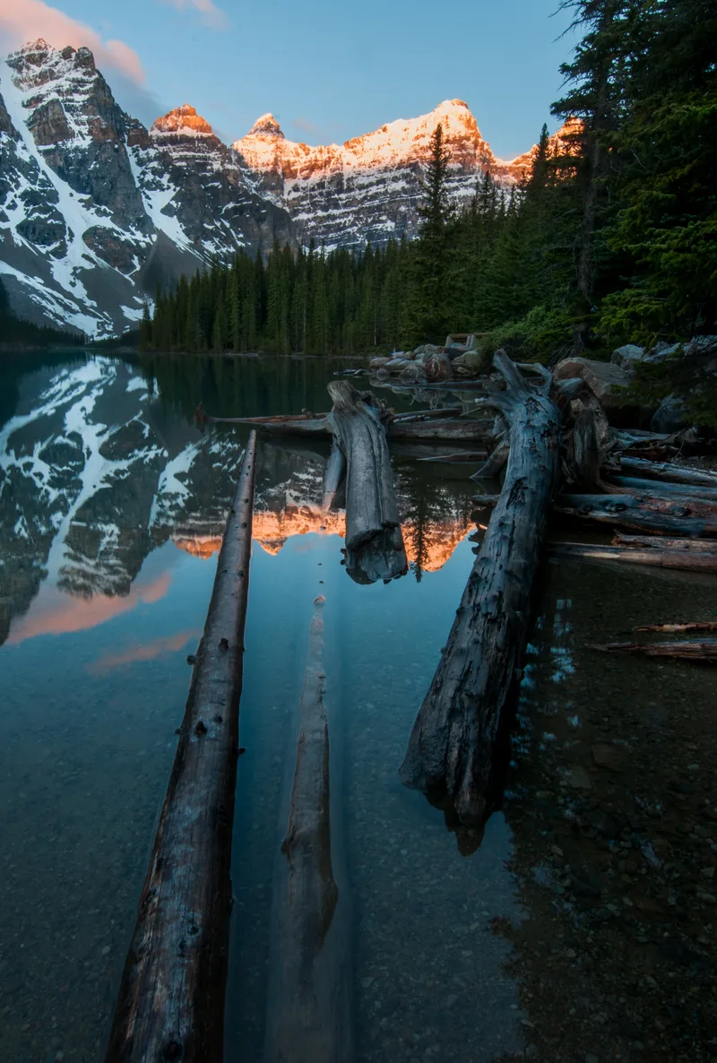 Vertical Shot Wood Pieces Lake With Reflections Mountains Moraine Lake