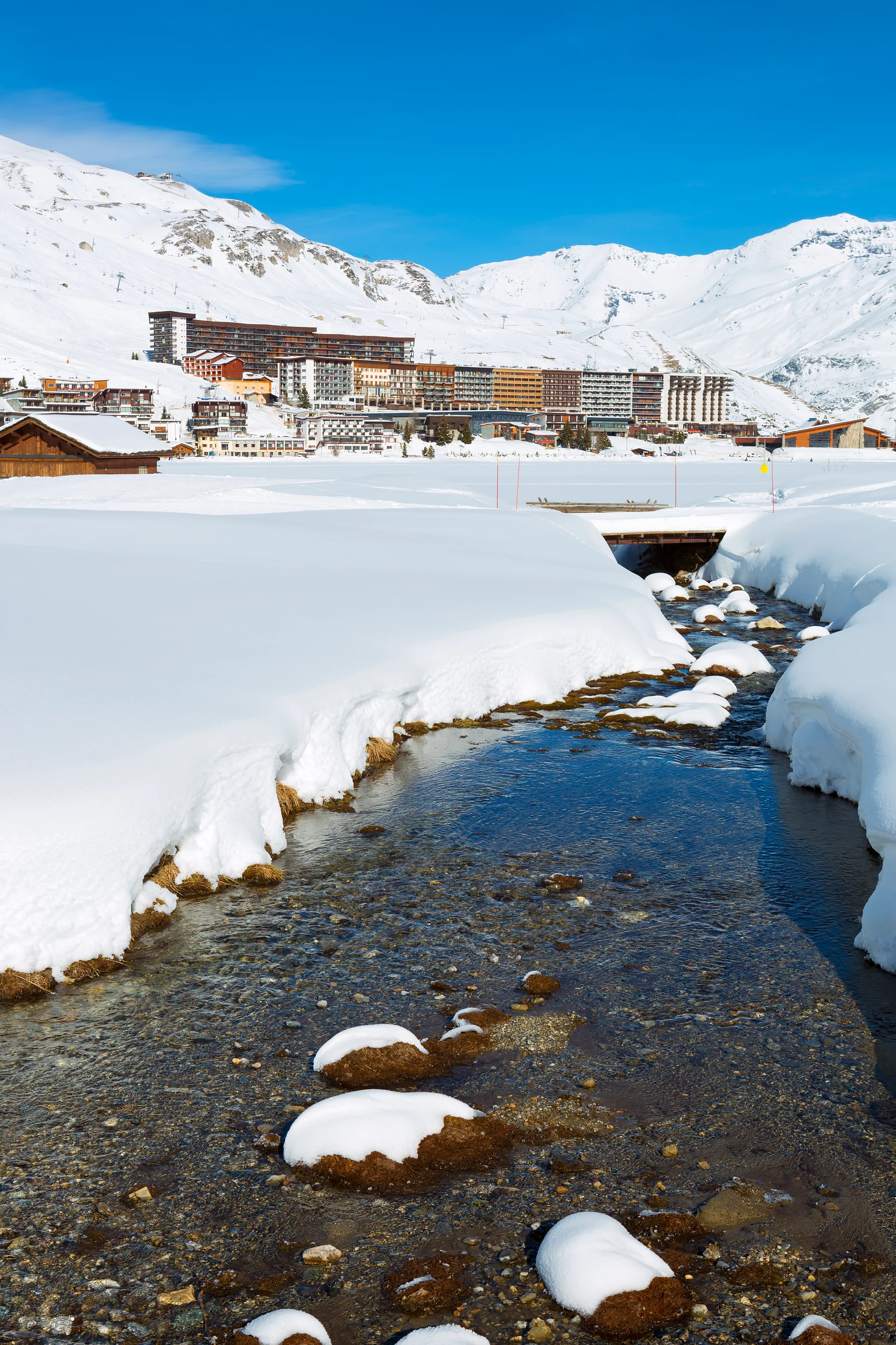 Vertical View Tignes Village Winter France. Aerial wallpaper. 3770×5655px. Free download for personal use.