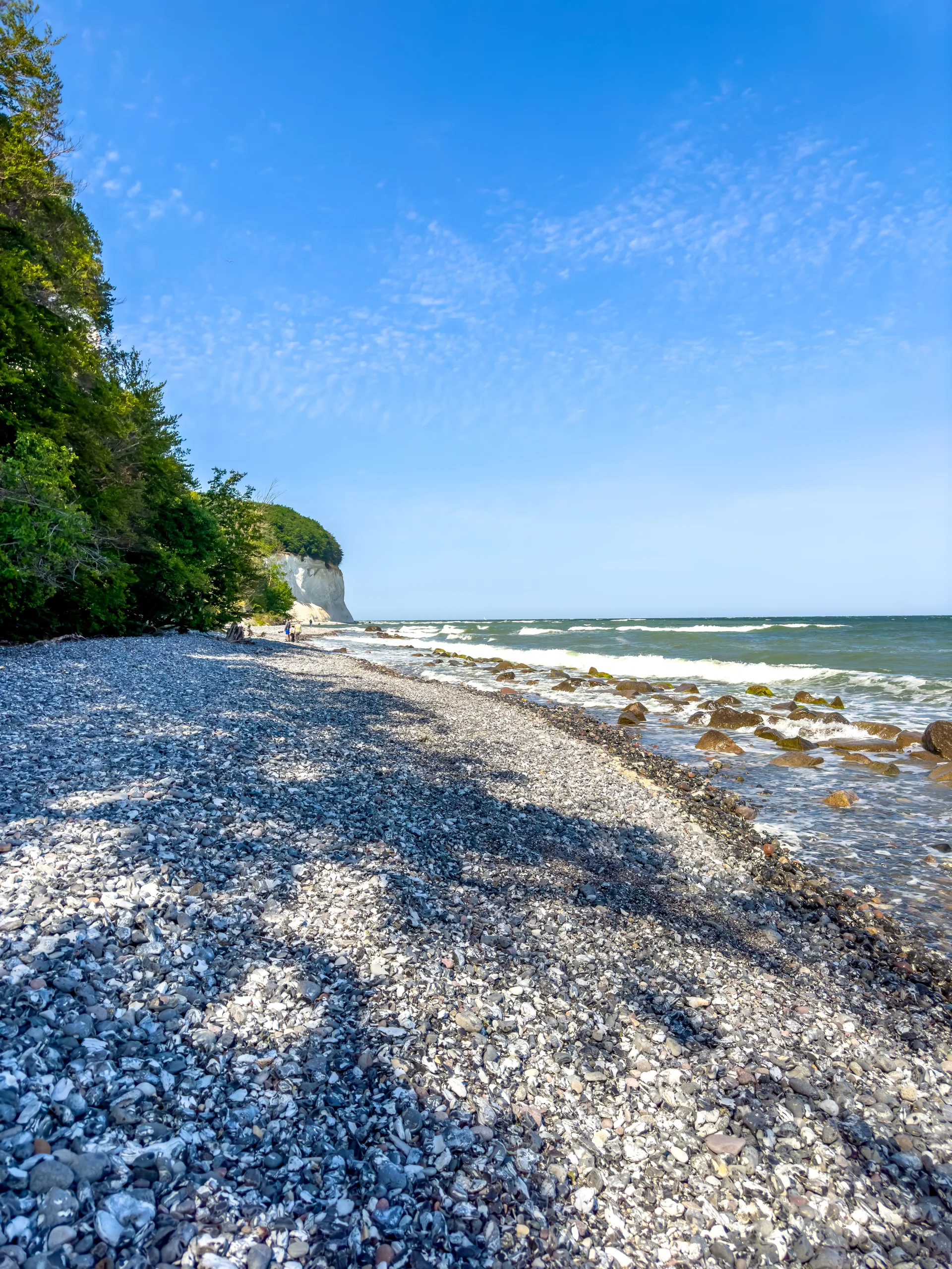 Waves Sea Near Coastline Empty Pebble Beach. Nature wallpaper. 6048×8064px. Free download for personal use.