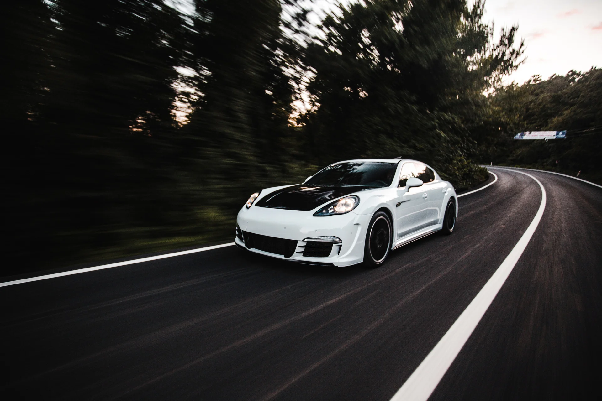 White Sport Car With Black Autotuning Driving With High Speed Road. Cities wallpaper. 5472×3648px. Free download for perso…