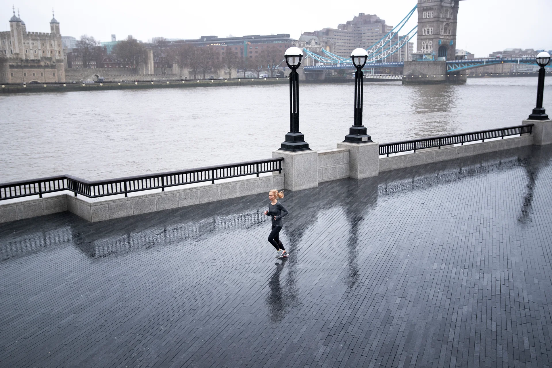 Woman Running Outside While It Rains. People wallpaper. 7990×5327px. Free download for personal use.