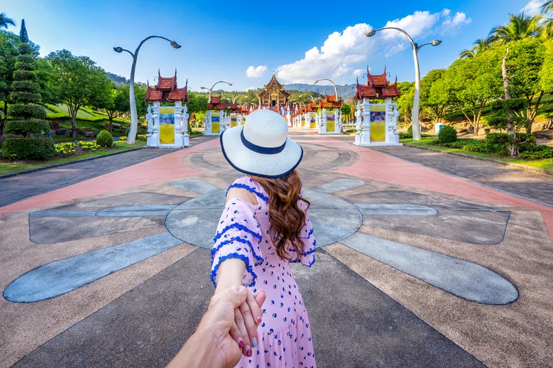 Women Tourists Holding Man S Hand Leading Him Ho Kham Luang Northern Thai Style Royal Flora Ratchaphruek Chiang Mai Thailand