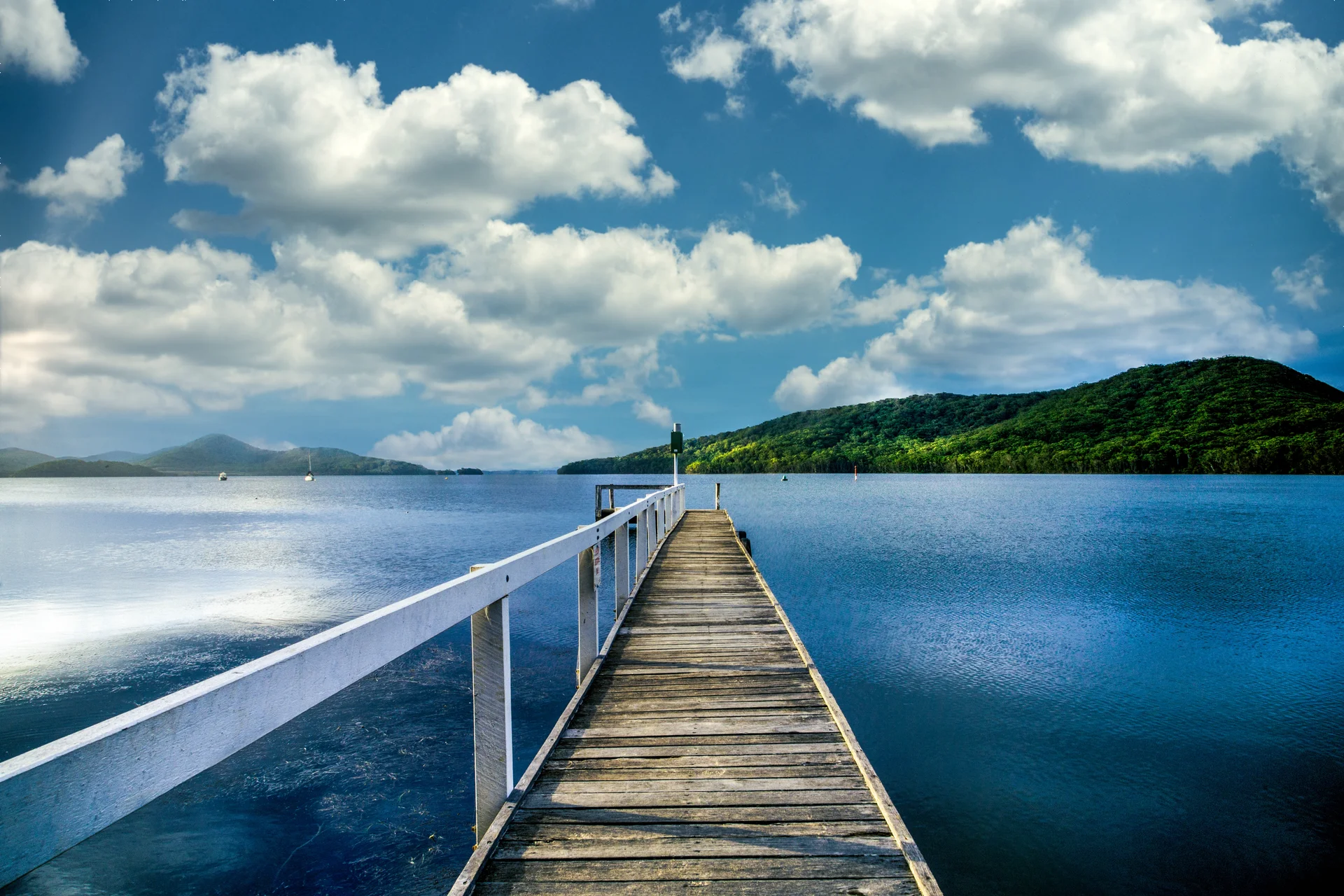 Wooden Footbridge Leading Into Lake. Nature wallpaper. 5688×3792px. Free download for personal use.
