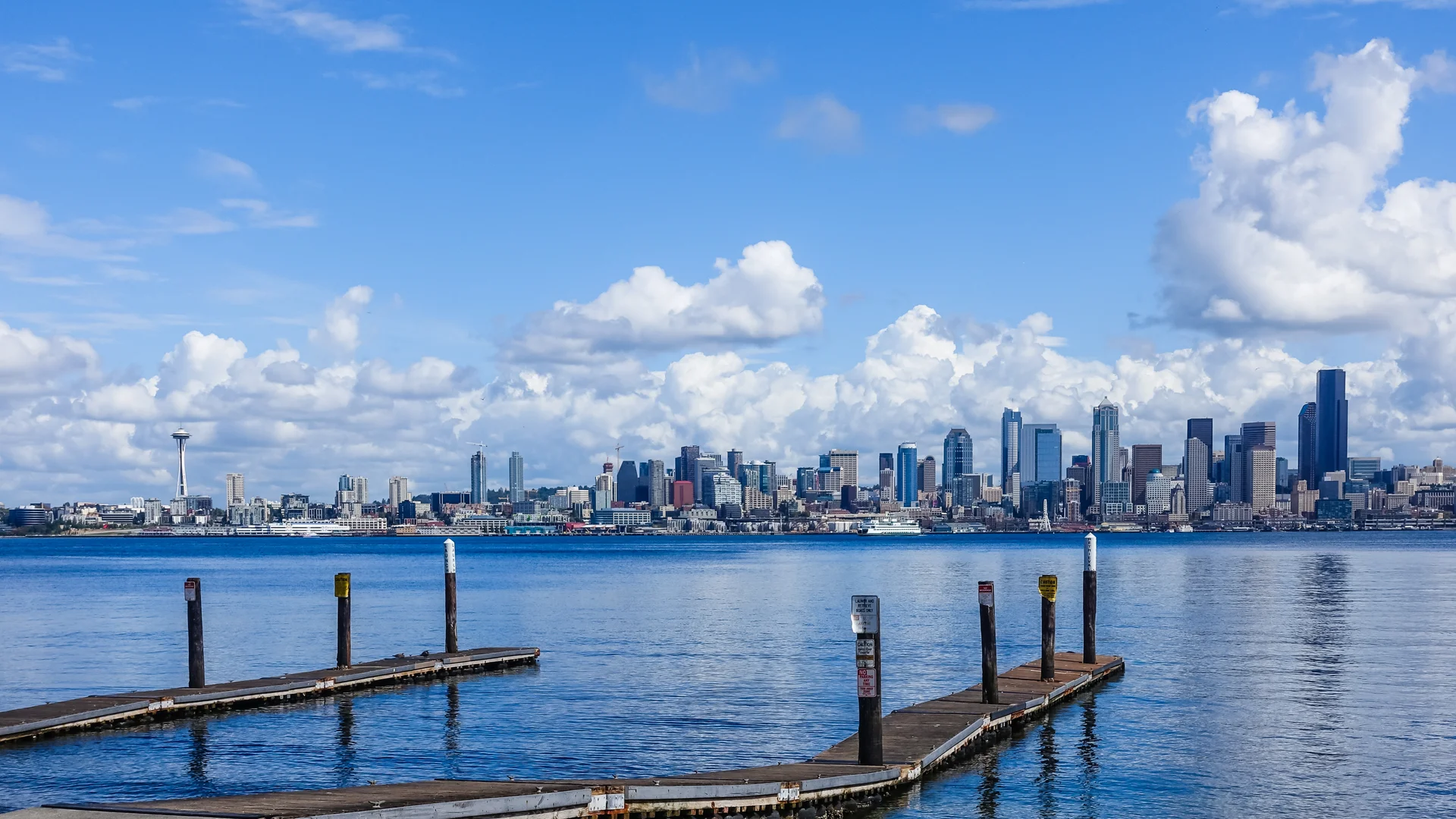 Wooden Pier Sea With City Seattle Usa Beautiful Clouds. Nature wallpaper. 5301×2982px. Free download for personal use.